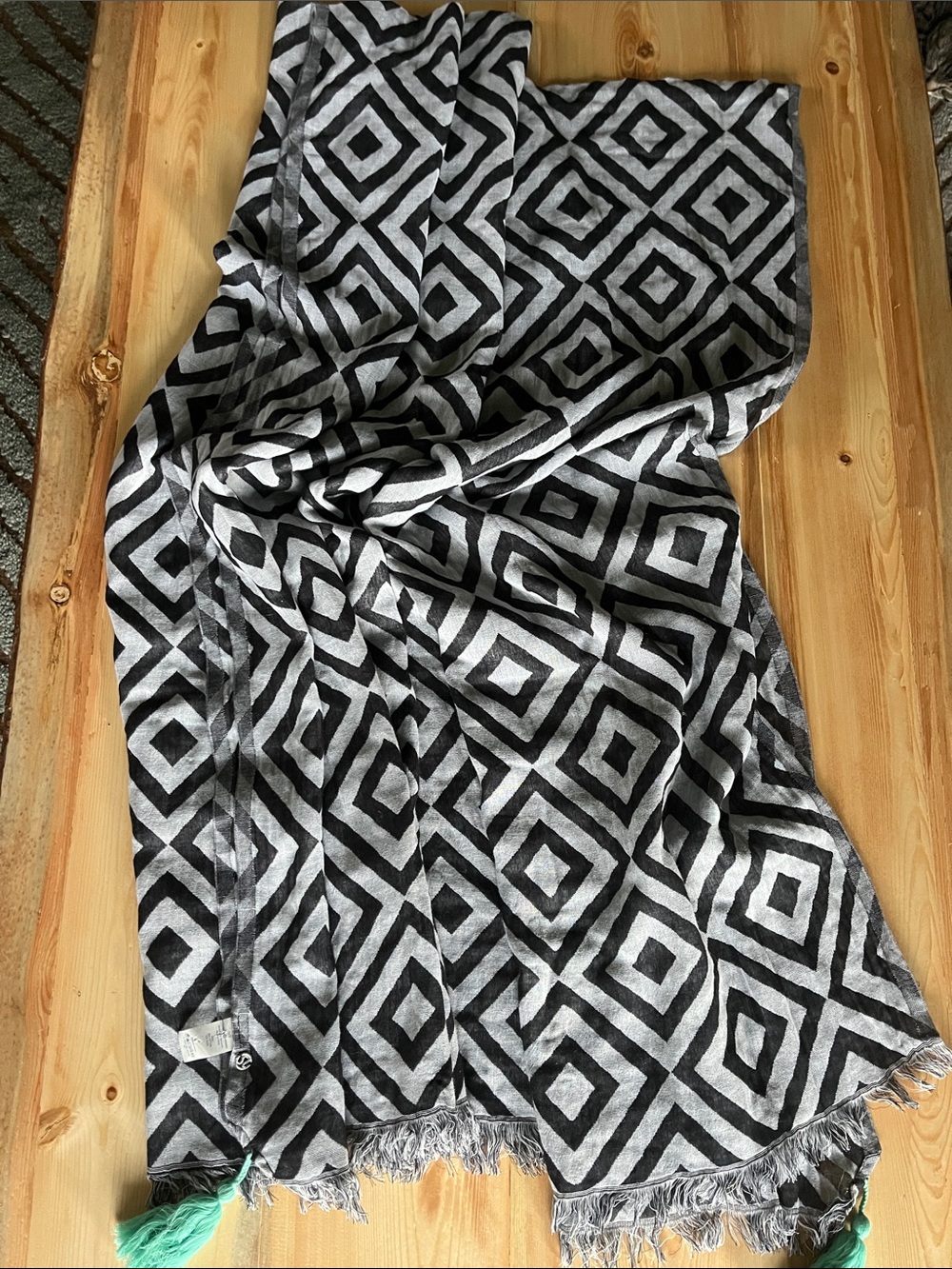 Lululemon “Find Your Om” Scarf with Geometric Black and White Peint/Teal Tassels